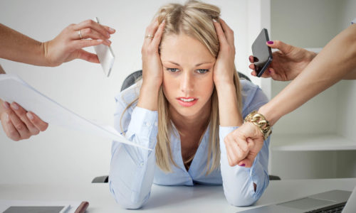 Pressure at work: depressed business woman